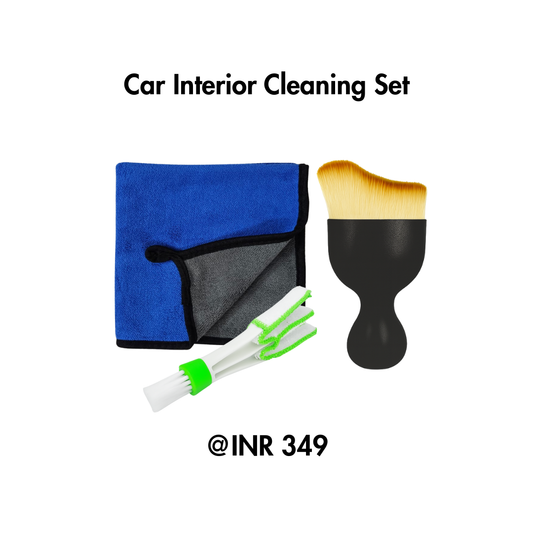 Car interior cleaning set with blue towel, brush, and small tools on a white background
