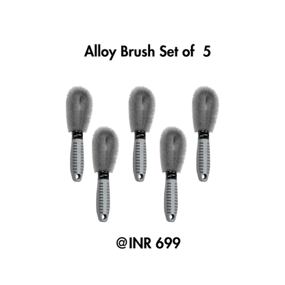 Set of five alloy brushes with a price tag on a white background