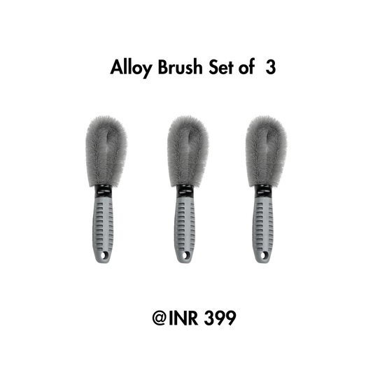 Set of three alloy brushes with gray bristles and black handles on a white background.