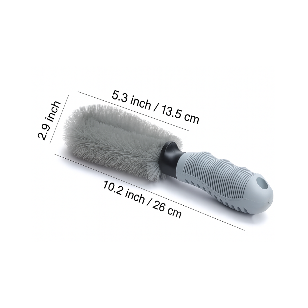 Gray brush with measurements on a white background
