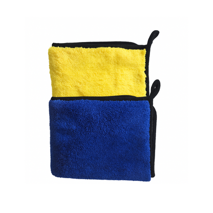Two-section towel with yellow top and blue bottom on a white background