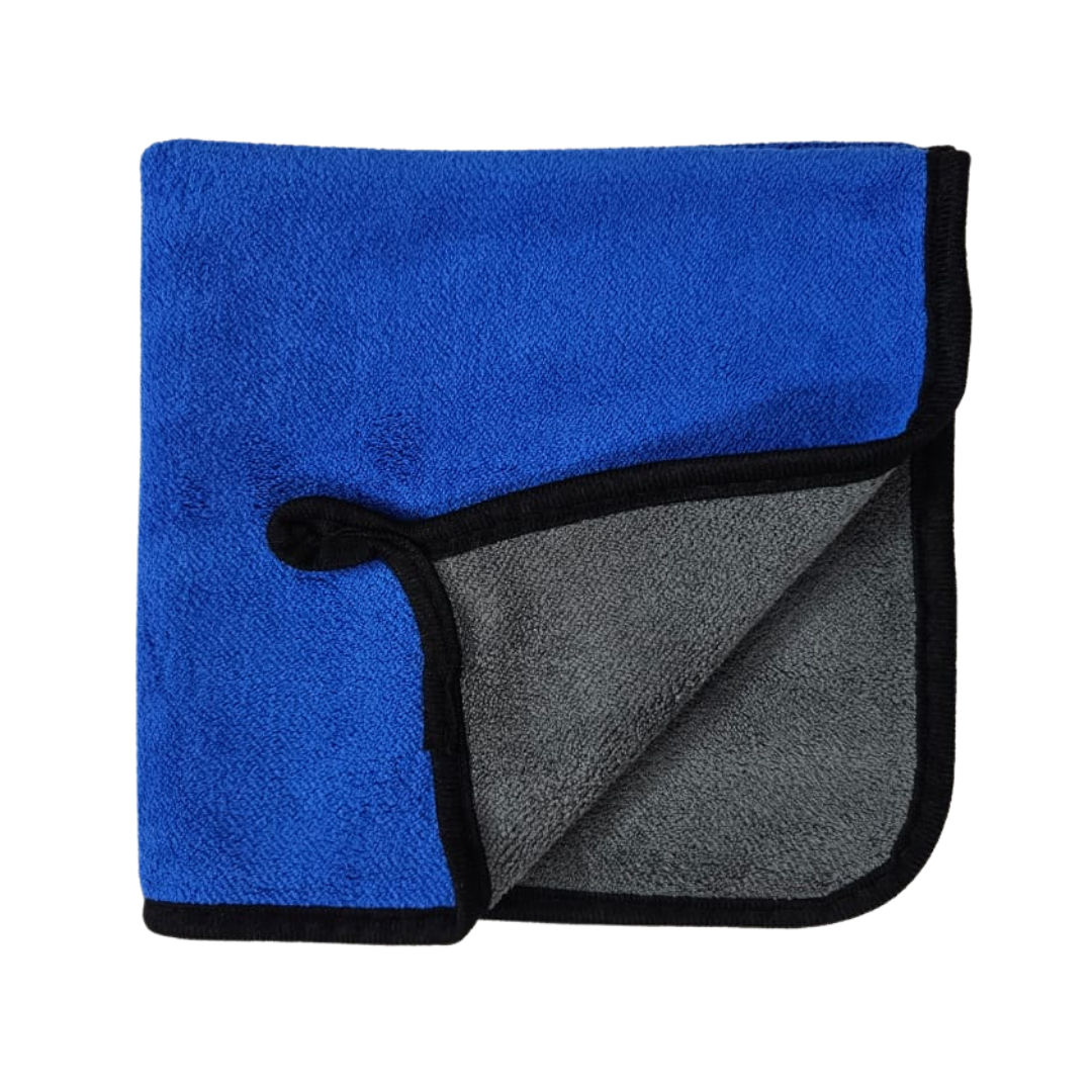 Folded towel with blue and gray sides on a white background
