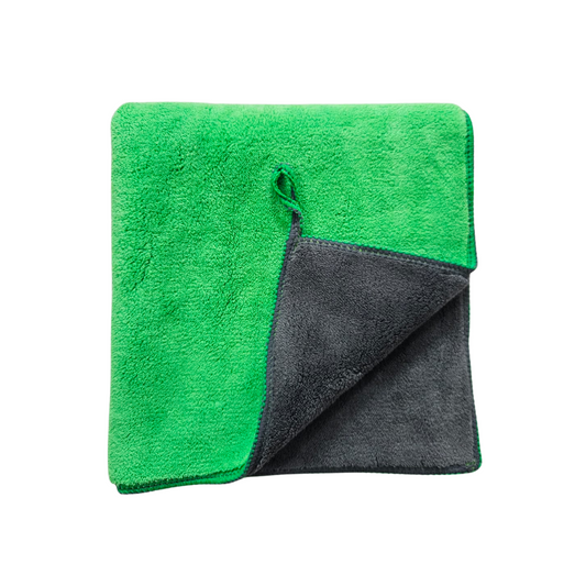 Green and gray towel folded on a white background