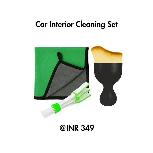 Car interior cleaning set with towel, brush, and cleaning sticks on a white background