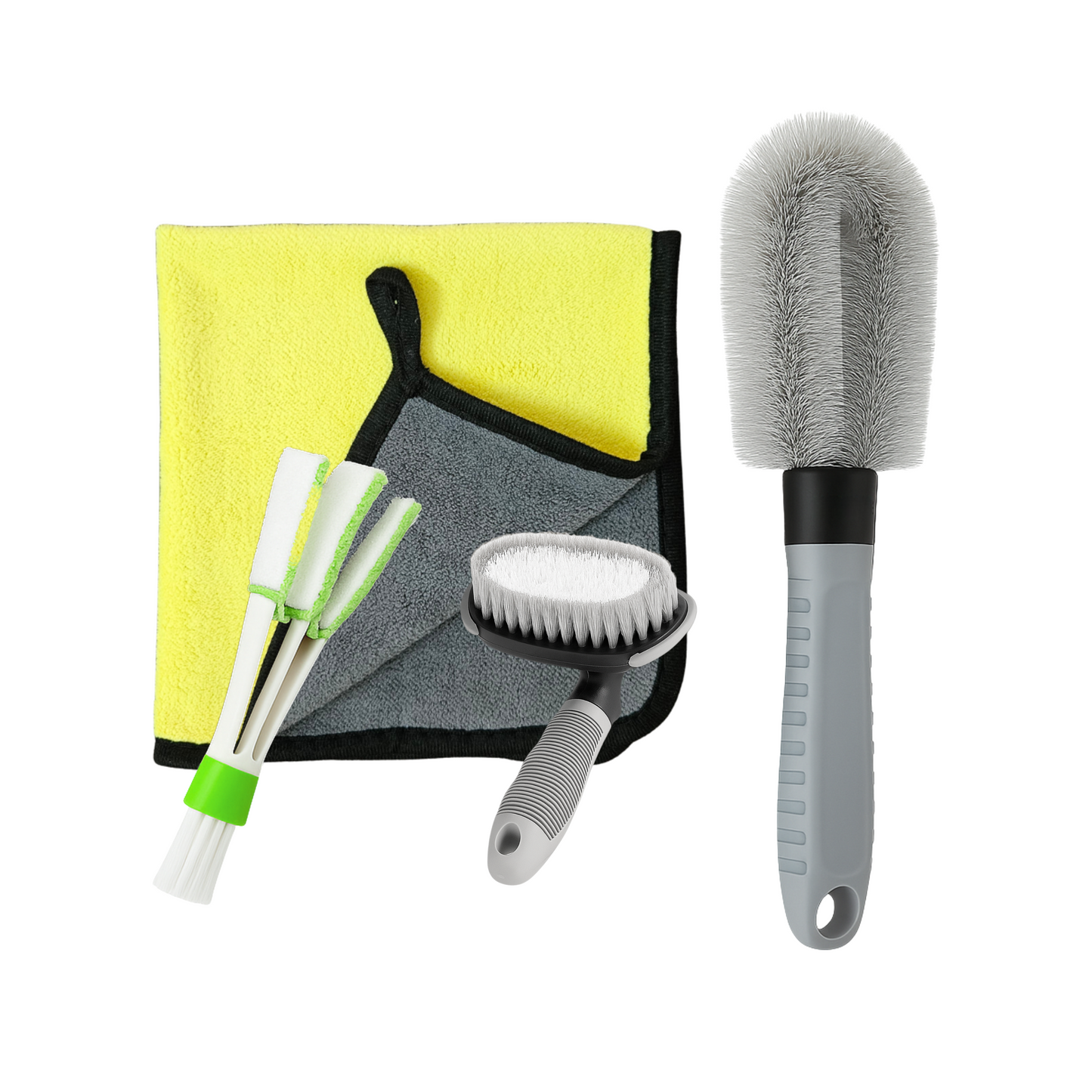Car cleaning tool set with brushes, scrubber, and towel on a white background