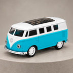 Turquoise and white retro van die-cast model on a neutral studio plinth